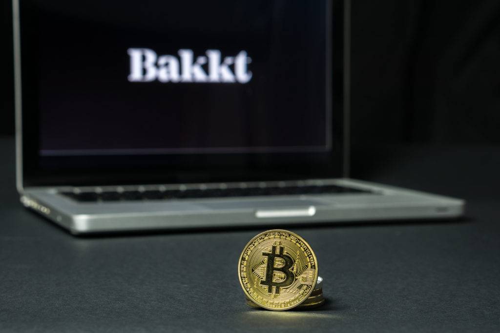 Bitcoin coin with the Bakkt logo on a laptop screen, Slovenia - December 23th, 2018